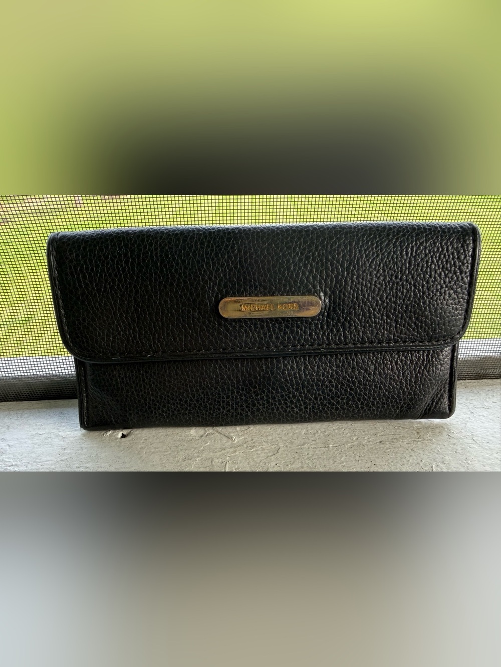 Michael Kors Black Pebbled Leather Flap Wallet with Gold Plaque GUC